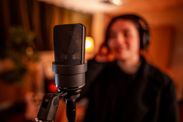 Vocal recording session with Neumann microphone